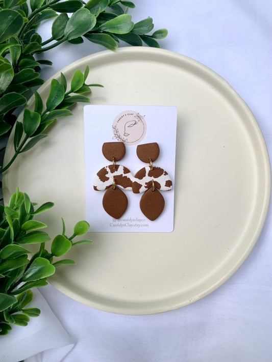 Who's That Heifer - Brown & White 3 Tier Clay Earrings